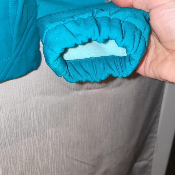 Teal green kid’s jacket with reflective strips - Picture 2 of 4